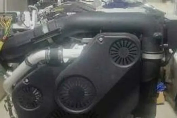 Alliance Yacht Photos Pics Engine of a 2022 Custom Freestyle Marine 32 boat, showcasing intricate mechanical components.