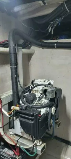 Alliance Yacht Photos Pics Engine room of 2022 Custom Freestyle Marine 32 boat, showcasing mechanical components.