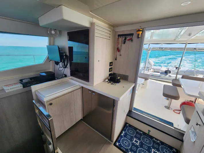 Salty Mitches Yacht Photos Pics Interior of 2016 Leopard 51 Powercat yacht with ocean view and modern amenities.