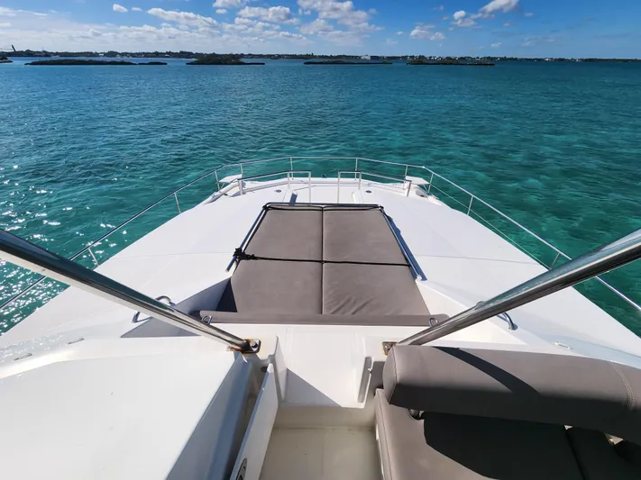 Salty Mitches Yacht Photos Pics Leopard 51 Powercat 2016 on clear blue water, sunny day, spacious deck view.