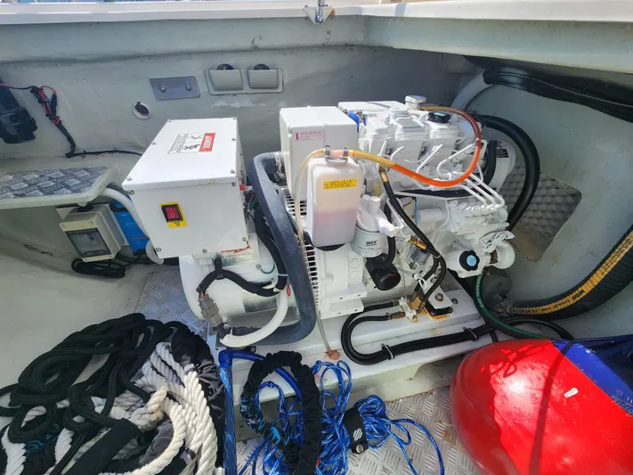 Salty Mitches Yacht Photos Pics Engine compartment of 2016 Leopard 51 Powercat with ropes and equipment.