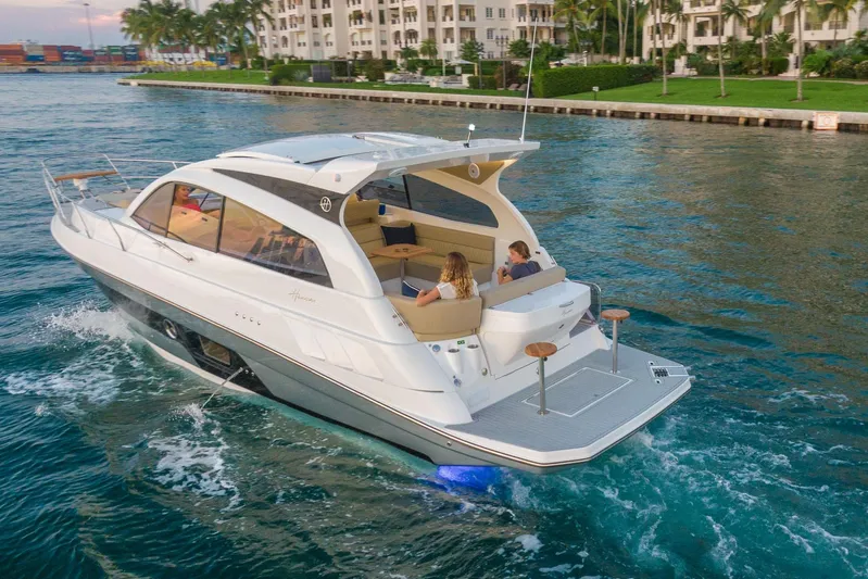  Yacht Photos Pics Luxurious 2026 Hanover 375 yacht cruising in a scenic waterfront setting.