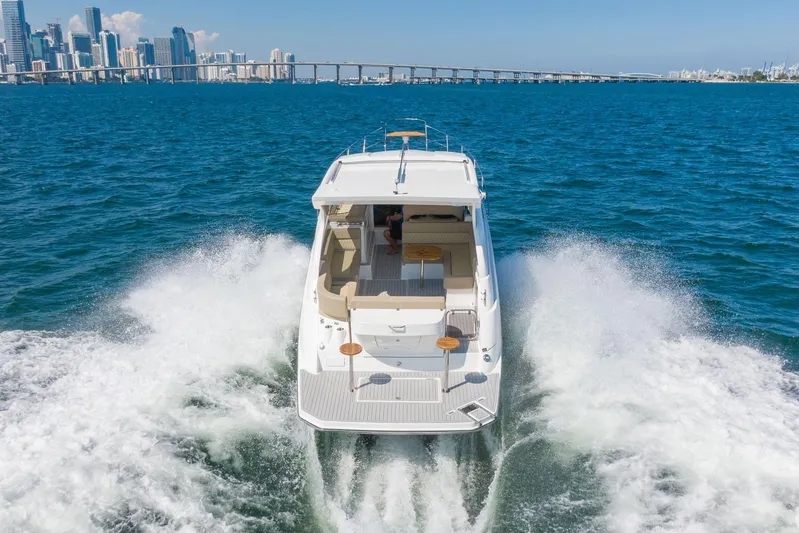  Yacht Photos Pics Luxury Hanover 375 yacht cruising near city skyline, 2026 model.