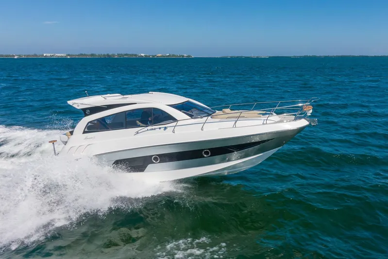  Yacht Photos Pics 2026 Hanover 375 yacht cruising on open blue sea under clear sky.