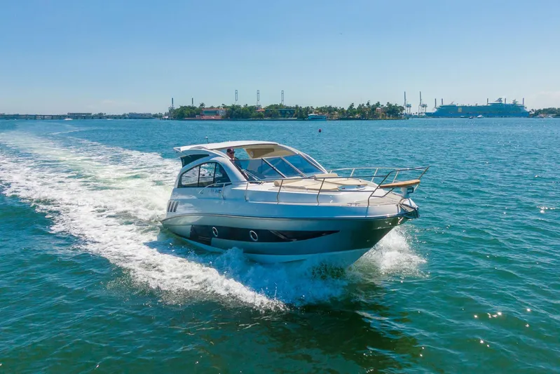  Yacht Photos Pics 2026 Hanover 375 yacht cruising on open water under clear blue skies.