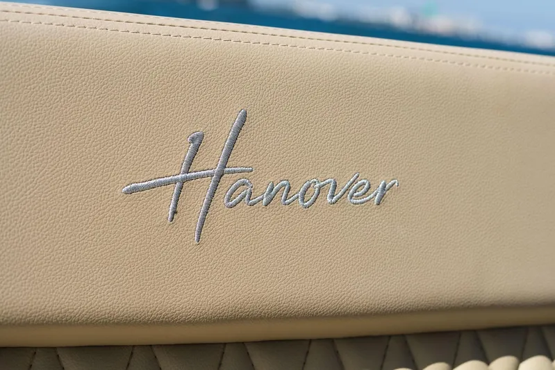  Yacht Photos Pics Luxurious beige leather interior with "Hanover" embroidery, 2026 Hanover 375 model.