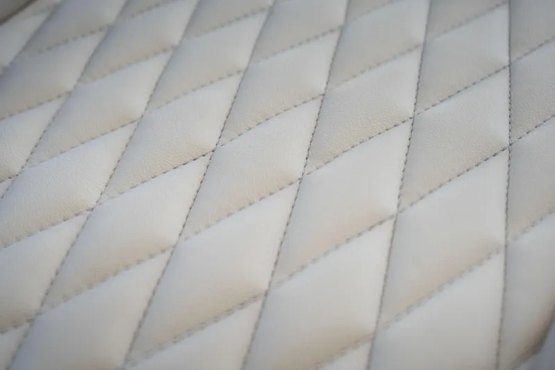  Yacht Photos Pics Quilted leather upholstery in Hanover 375, 2026 model, showcasing luxury craftsmanship.