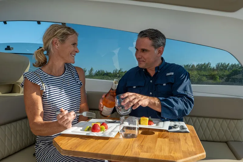  Yacht Photos Pics Couple enjoying a meal on a Hanover 375 yacht, 2026 model.