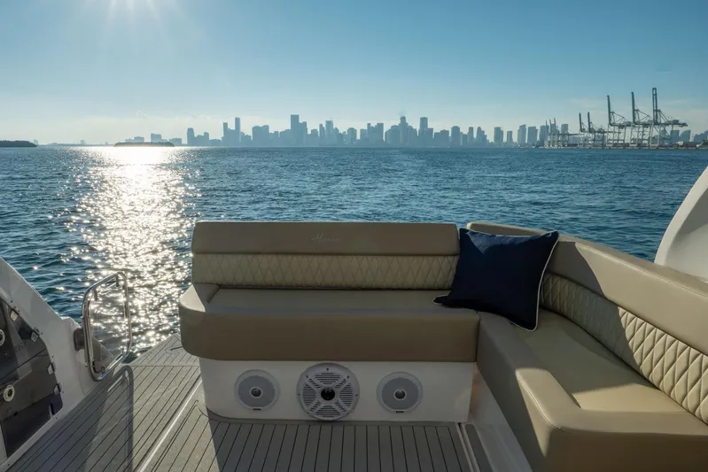  Yacht Photos Pics Luxurious Hanover 375 yacht interior with city skyline and ocean view, 2026 model.