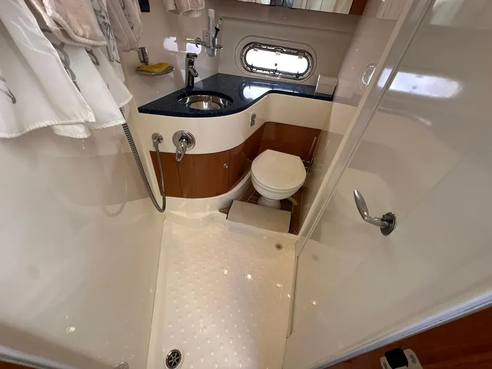 Maurizio Nesti Yacht Photos Pics 2007 Sealine F42/5 yacht bathroom with shower, sink, and toilet.