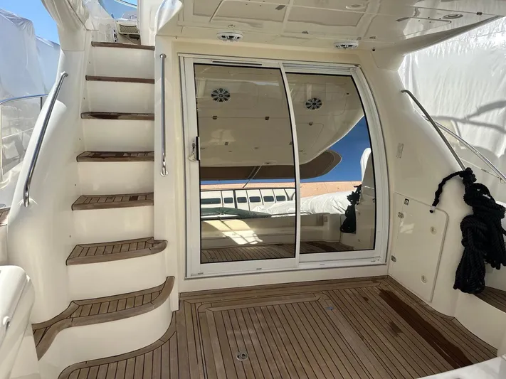 Maurizio Nesti Yacht Photos Pics 2007 Sealine F42/5 yacht with teak deck and sliding glass doors.