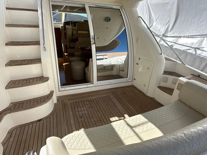Maurizio Nesti Yacht Photos Pics 2007 Sealine F42/5 yacht interior with wooden deck and seating area.