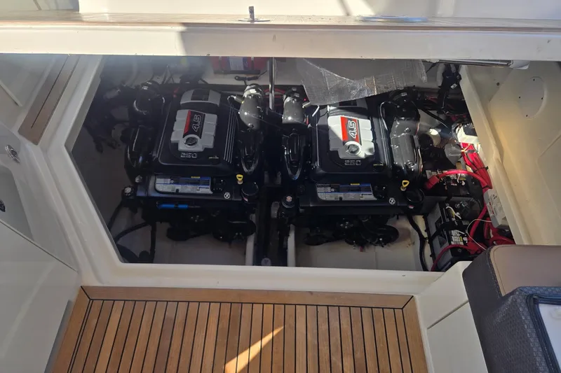 The Braciole Yacht Photos Pics Engine compartment of 2017 Sea Ray 310 Sundancer with twin 4.5L engines.