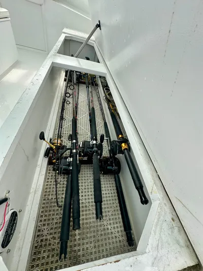 Wire Nut Yacht Photos Pics Fishing rods stored in a compartment on a 2002 Custom Carolina 40 Express Sportfisherman.