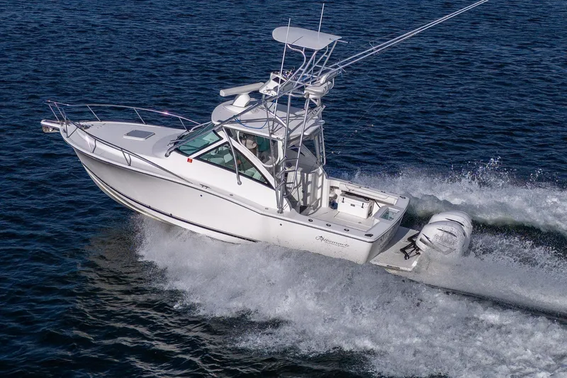 Seaclusion Yacht Photos Pics 2018 Albemarle 290 Express Fisherman boat cruising on open water.
