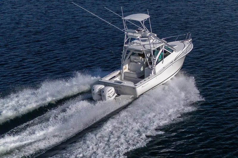 Seaclusion Yacht Photos Pics 2018 Albemarle 290 Express Fisherman cruising on open water, showcasing powerful twin engines.