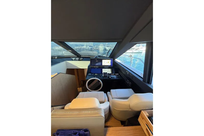  Yacht Photos Pics Luxurious helm of 2025 Ferretti Yachts 720 with modern navigation systems.