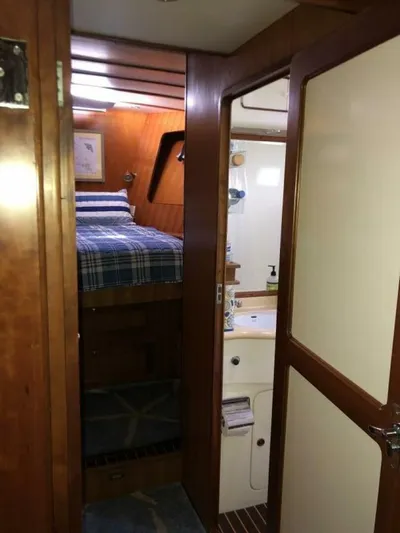 Off The Grid Yacht Photos Pics 2001 Selene Ocean Trawler interior with cozy cabin and bathroom.
