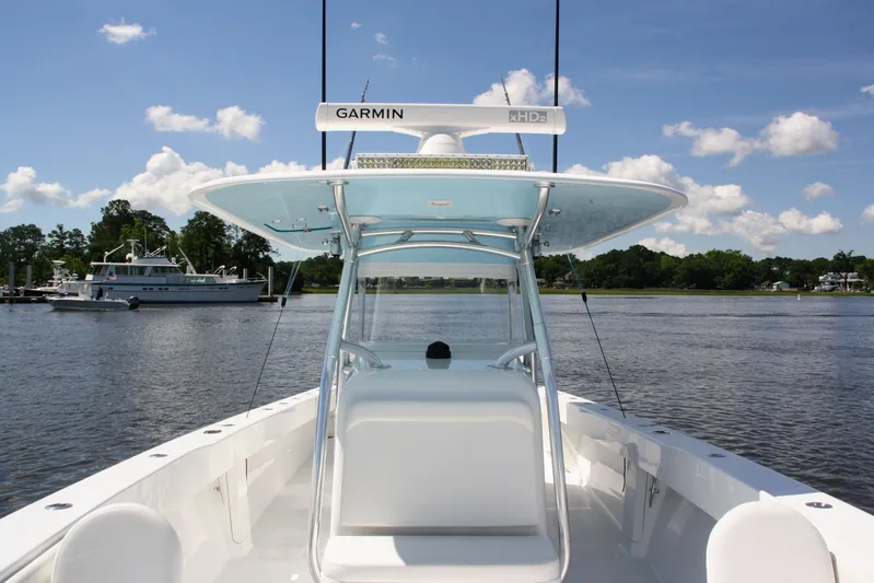  Yacht Photos Pics 2019 Bahama 41 boat with Garmin equipment on a calm lake under a clear sky.