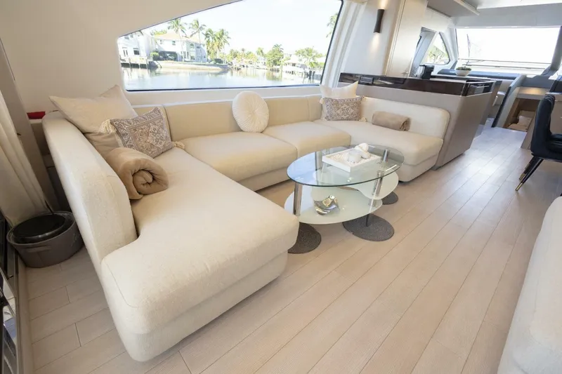 Rho Boat Yacht Photos Pics Luxurious interior of 2021 Azimut Fly 72 yacht with elegant seating and glass table.