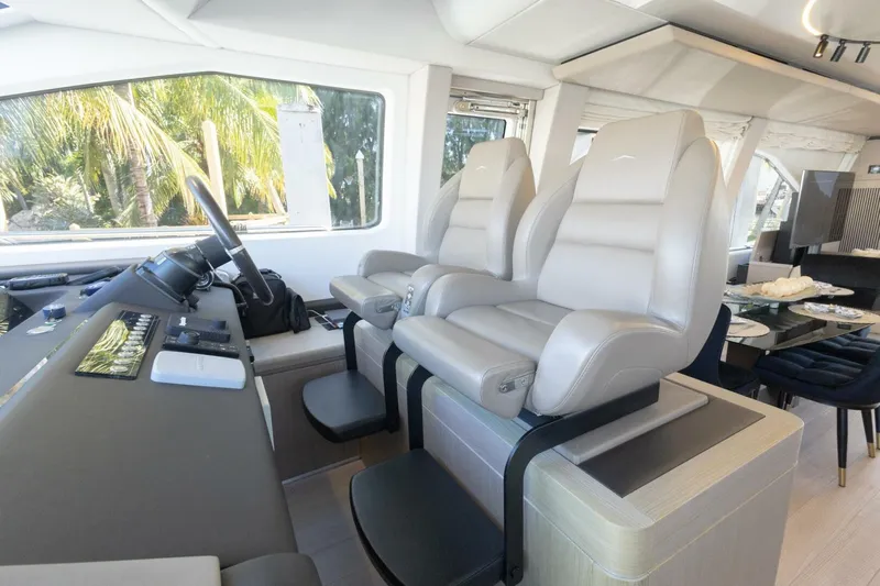 Rho Boat Yacht Photos Pics Interior of 2021 Azimut Fly 72 yacht with luxurious seating and modern helm.
