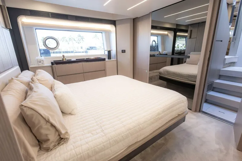 Rho Boat Yacht Photos Pics Luxurious bedroom interior of 2021 Azimut Fly 72 yacht with modern design and large window.