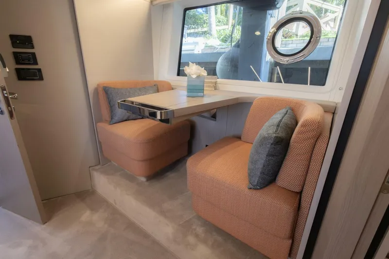 Rho Boat Yacht Photos Pics Luxurious interior seating area on 2021 Azimut Fly 72 yacht.