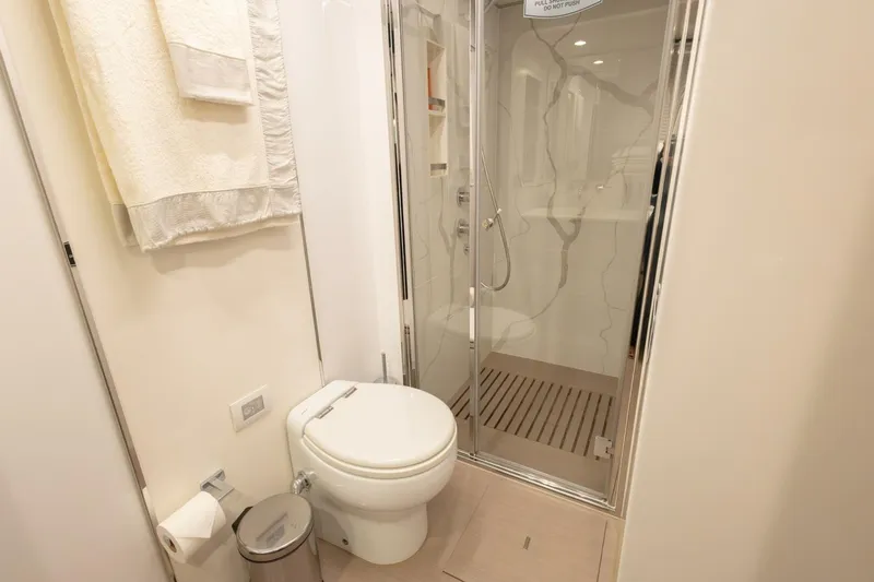 Rho Boat Yacht Photos Pics Luxurious bathroom in 2021 Azimut Fly 72 yacht with modern shower and toilet.