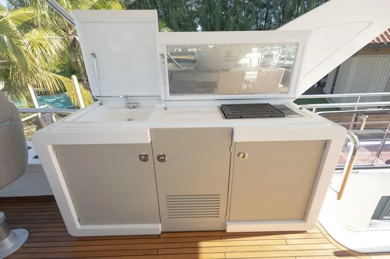 Rho Boat Yacht Photos Pics Outdoor kitchen on 2021 Azimut Fly 72 yacht with grill and storage.