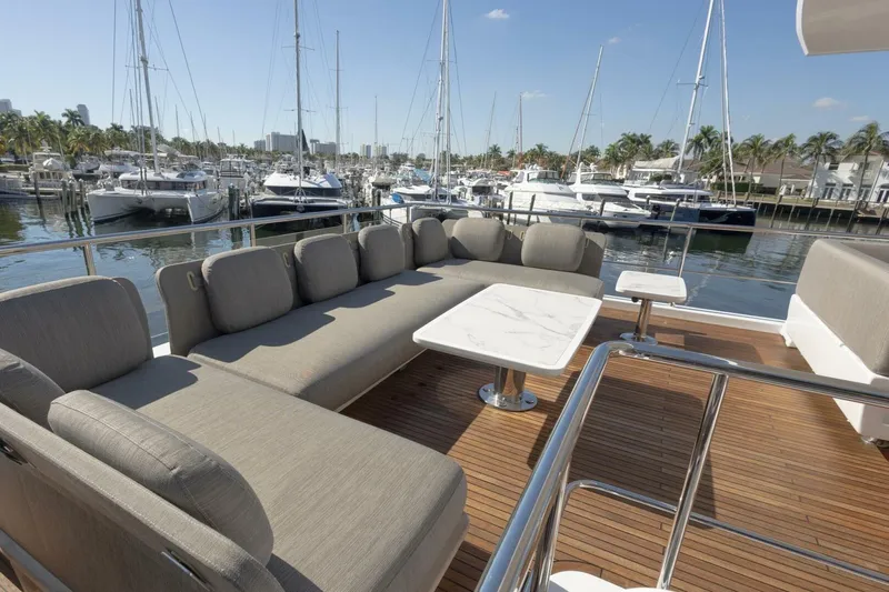 Rho Boat Yacht Photos Pics Luxurious seating area on 2021 Azimut Fly 72 yacht, docked at marina.