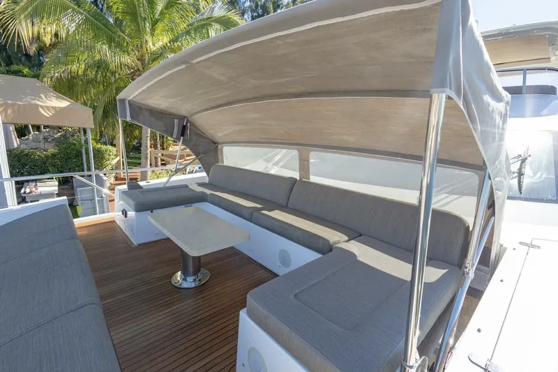 Rho Boat Yacht Photos Pics Luxurious 2021 Azimut Fly 72 yacht deck with shaded seating area.