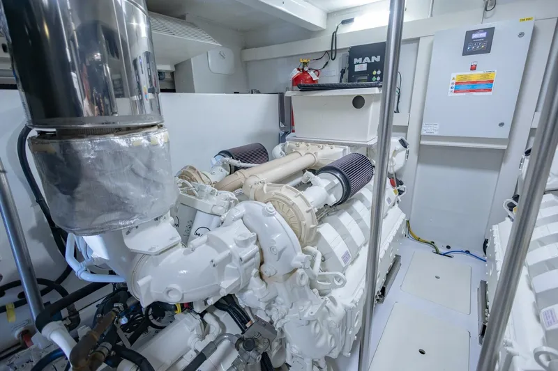 Rho Boat Yacht Photos Pics Engine room of 2021 Azimut Fly 72 yacht, featuring advanced machinery and control systems.