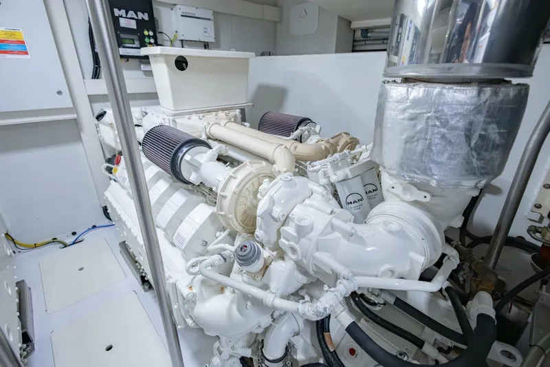 Rho Boat Yacht Photos Pics Engine room of 2021 Azimut Fly 72 yacht, featuring a MAN engine.