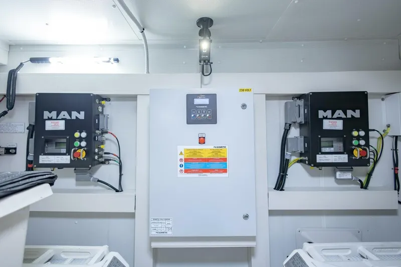 Rho Boat Yacht Photos Pics Engine room of 2021 Azimut Fly 72 yacht with MAN control panels.