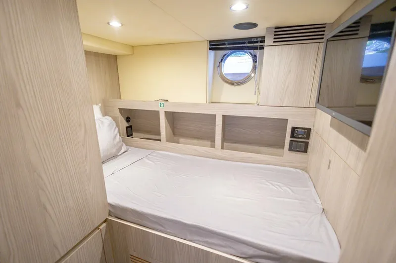 Rho Boat Yacht Photos Pics 2021 Azimut Fly 72 yacht cabin with modern design and porthole window.