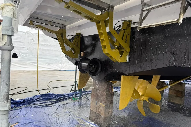 Rho Boat Yacht Photos Pics Azimut Fly 72 yacht under maintenance, showcasing propeller and hydraulic components, 2021 model.