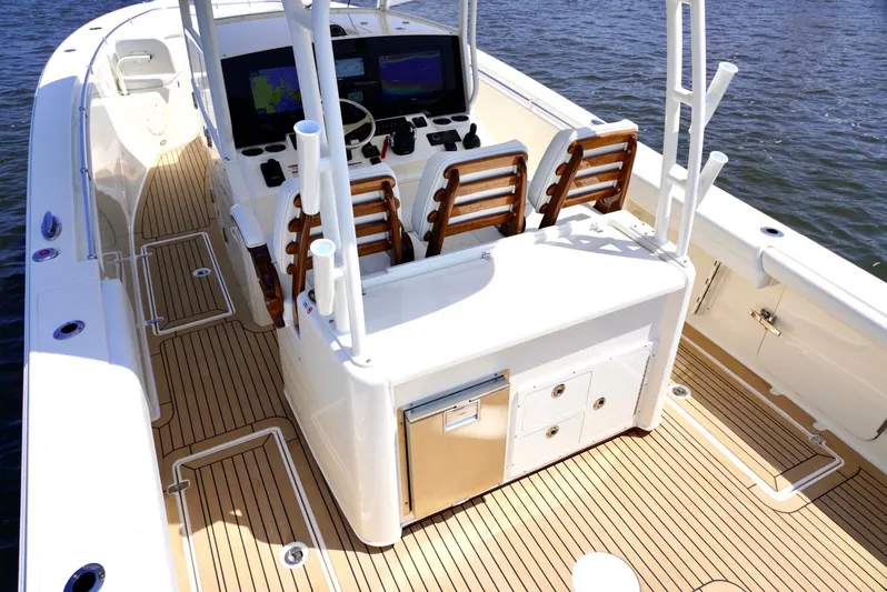  Yacht Photos Pics 2020 Cobia 350 Center Console boat with teak deck and modern helm station.