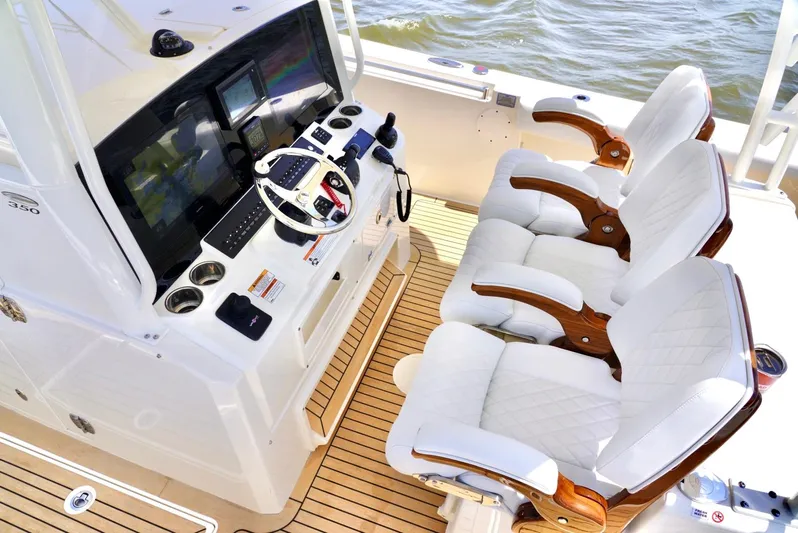  Yacht Photos Pics 2020 Cobia 350 Center Console boat interior with helm and luxurious seating.
