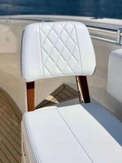  Yacht Photos Pics Luxury seating on 2020 Cobia 350 Center Console boat with diamond-stitched upholstery.