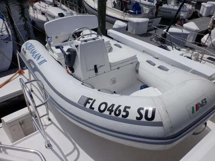 Epic Yacht Photos Pics Inflatable boat on 1998 Bayliner 4788 Pilothouse Motoryacht, docked at marina.