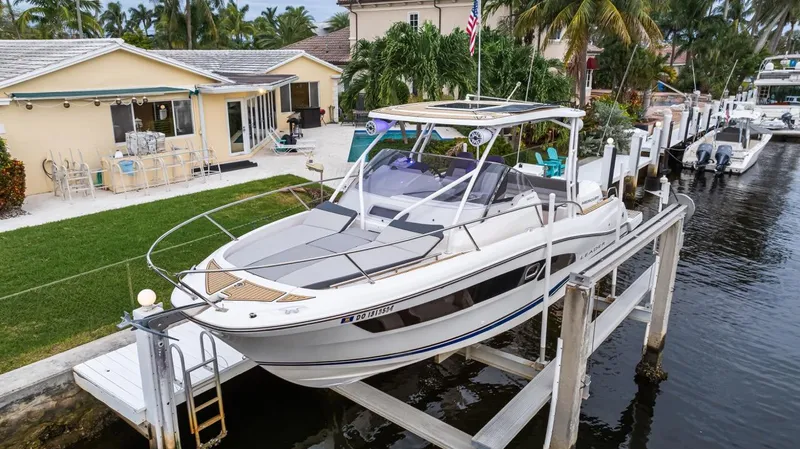  Yacht Photos Pics 2020 Jeanneau Leader 9.0 WA boat docked by waterfront home.