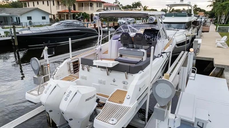  Yacht Photos Pics 2020 Jeanneau Leader 9.0 WA boat docked with twin engines, luxury seating, and modern design.