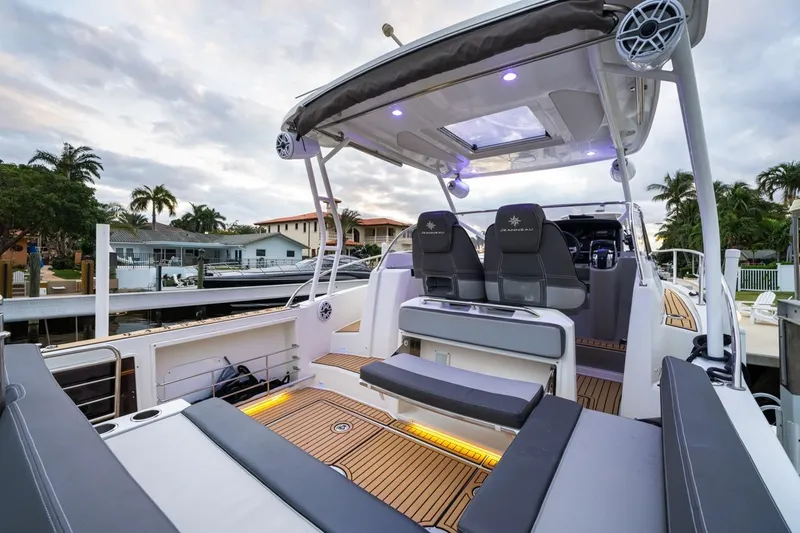  Yacht Photos Pics 2020 Jeanneau Leader 9.0 WA boat interior with modern seating and ambient lighting.