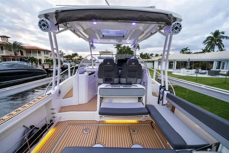  Yacht Photos Pics 2020 Jeanneau Leader 9.0 WA boat interior with modern seating and deck lighting.