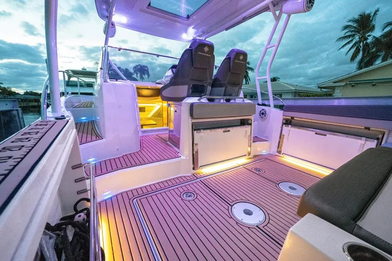  Yacht Photos Pics 2020 Jeanneau Leader 9.0 WA boat interior with ambient lighting and modern design.