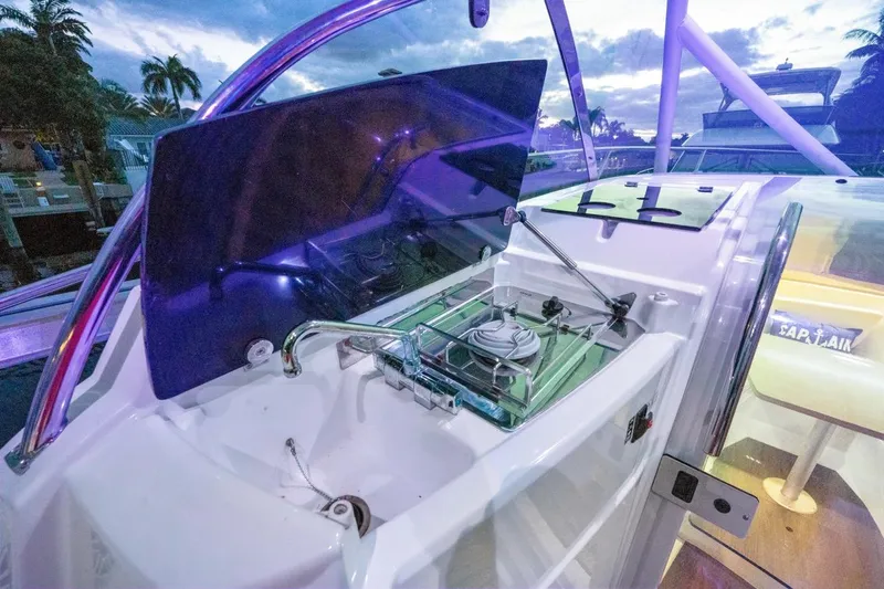  Yacht Photos Pics 2020 Jeanneau Leader 9.0 WA boat with open cockpit kitchen at sunset.