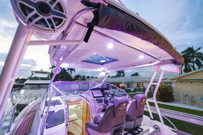  Yacht Photos Pics 2020 Jeanneau Leader 9.0 WA boat interior with illuminated cockpit and modern design.