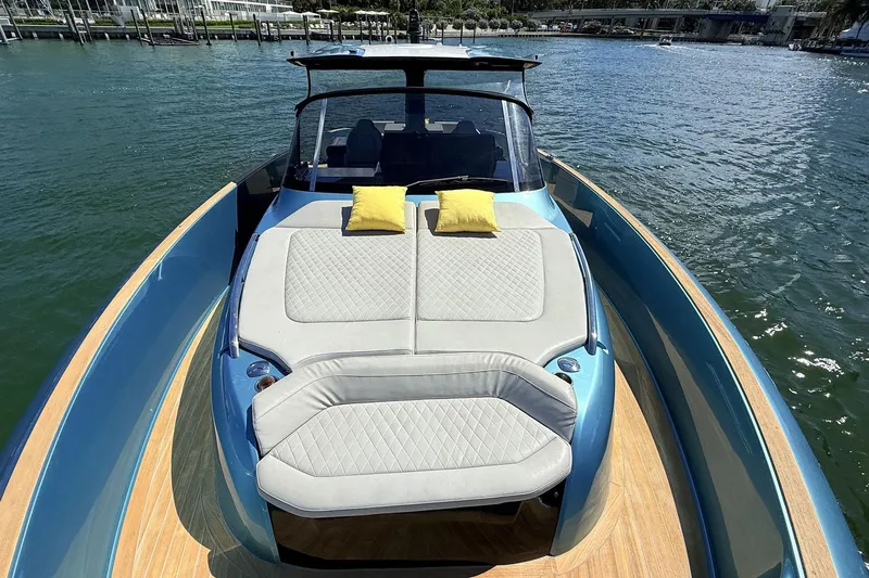  Yacht Photos Pics Luxurious 2022 Solaris Power 44 yacht with sunbed and cushions on deck.