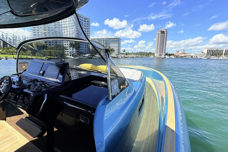  Yacht Photos Pics 2022 Solaris Power 44 yacht with sleek design, docked in a scenic waterfront location.