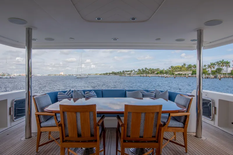 Spirit Yacht Photos Pics Luxury yacht Westport 112 (2010) aft deck with dining area and ocean view.